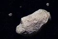 Montagem digital de um asteroide no espaço